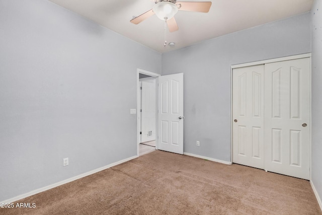 1265 S Aaron Unit 341, Mesa, AZ 85209 - unfurnished bedroom with carpet flooring, baseboards, a closet, and a ceiling fan