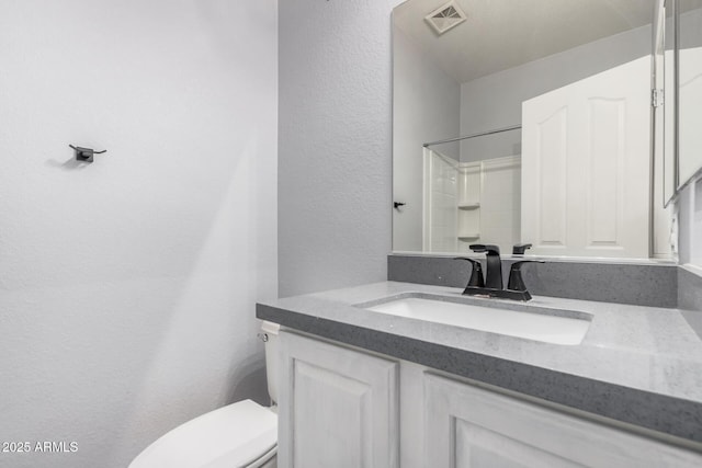 1265 S Aaron Unit 341, Mesa, AZ 85209 - full bath featuring vanity, toilet, and a textured wall