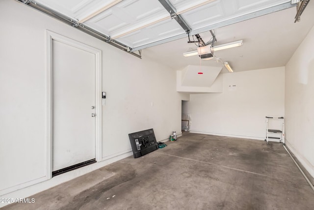 1265 S Aaron Unit 341, Mesa, AZ 85209 - garage featuring a garage door opener
