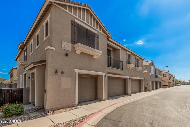 1265 S Aaron Unit 341, Mesa, AZ 85209 - view of property with a residential view and an attached garage