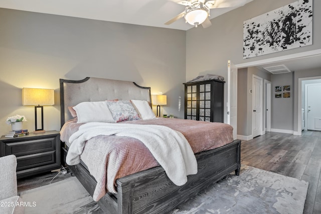 bedroom featuring hardwood / wood-style flooring and ceiling fan