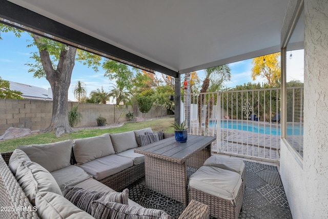 view of patio / terrace featuring a fenced in pool and outdoor lounge area