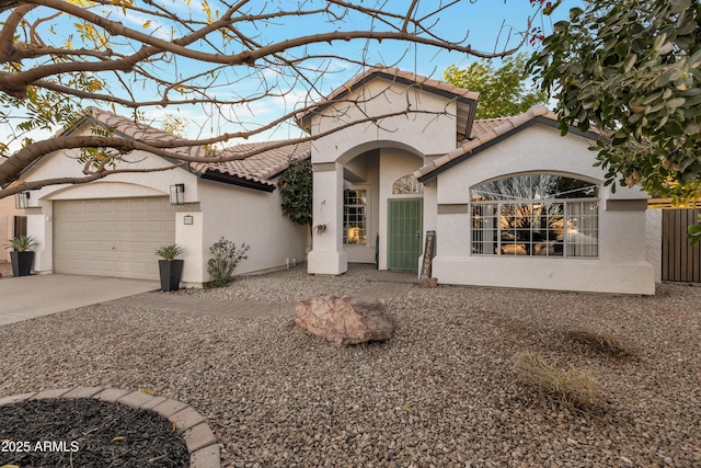 view of front of property featuring a garage