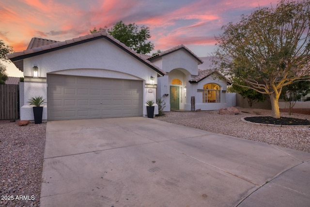 view of front of property featuring a garage