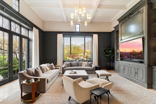 interior space with coffered ceiling, a towering ceiling, ornamental molding, beamed ceiling, and a chandelier