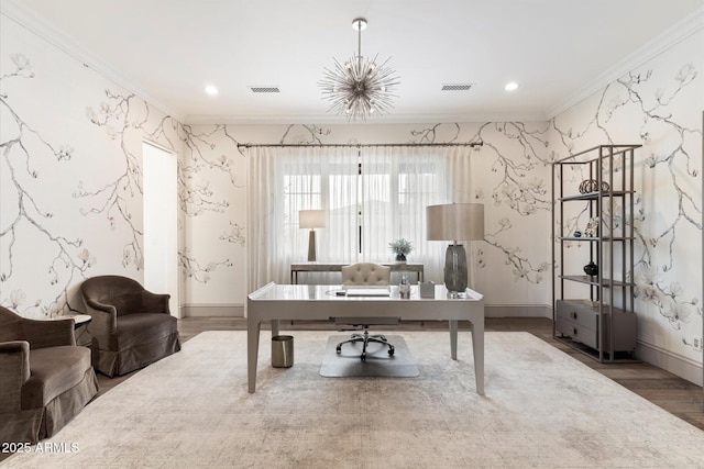 home office with wallpapered walls, wood finished floors, visible vents, and crown molding