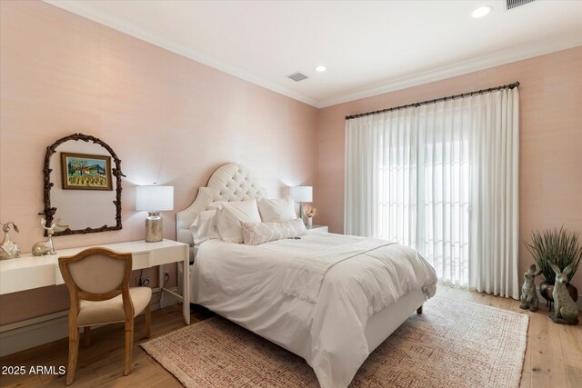 bedroom with ornamental molding, recessed lighting, visible vents, and wood finished floors