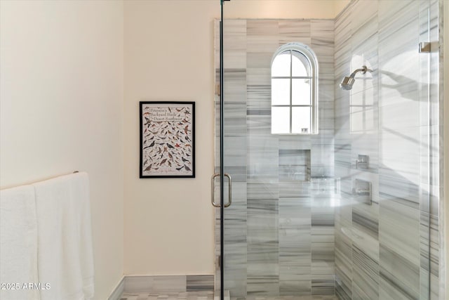 bathroom featuring a shower stall