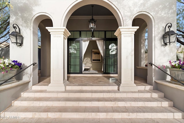 entrance to property featuring a porch