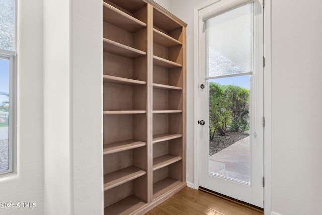 doorway to outside featuring hardwood / wood-style flooring