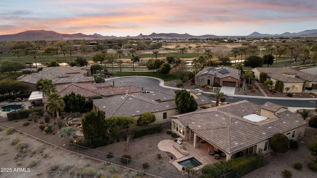 aerial view at dusk with a mountain view