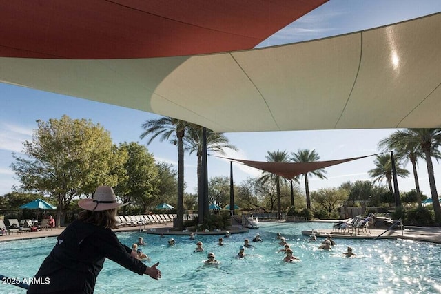 view of swimming pool featuring a patio