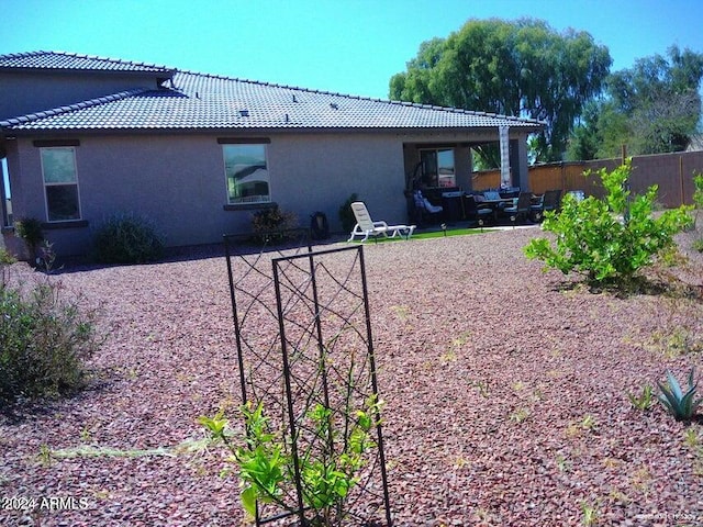 rear view of property with a patio