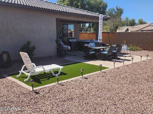 exterior space with a patio area