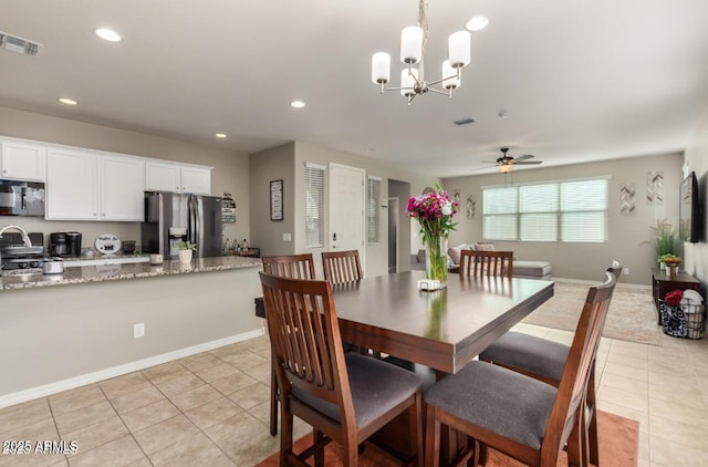 3914 S 58th Ln, Phoenix, AZ 85043 - dining area featuring light tile patterned floors, a chandelier, recessed lighting, ceiling fan, and baseboards