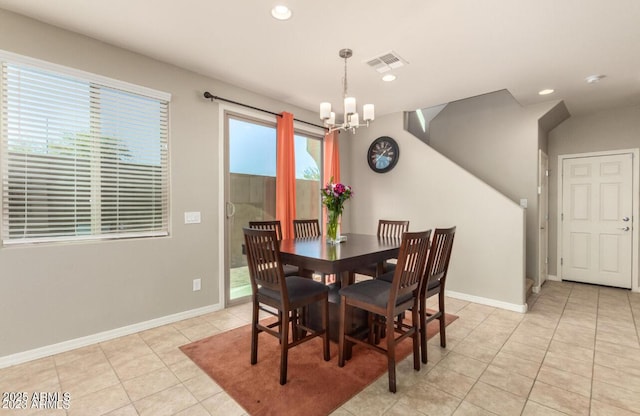 3914 S 58th Ln, Phoenix, AZ 85043 - dining area featuring a chandelier, light tile patterned floors, recessed lighting, and baseboards