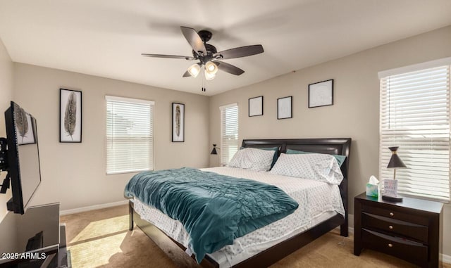 3914 S 58th Ln, Phoenix, AZ 85043 - carpeted bedroom with baseboards and ceiling fan