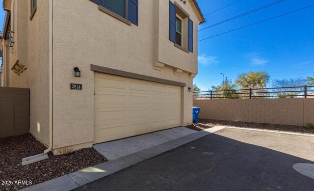 3914 S 58th Ln, Phoenix, AZ 85043 - garage with fence