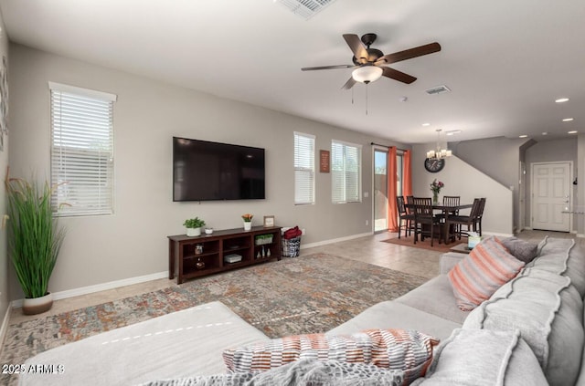3914 S 58th Ln, Phoenix, AZ 85043 - living area featuring healthy amount of natural light, a chandelier, baseboards, ceiling fan, and recessed lighting