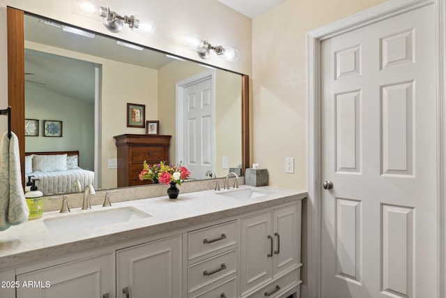 bathroom featuring vanity and vaulted ceiling