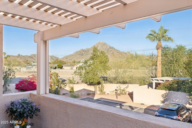 view of patio featuring a mountain view and a pergola