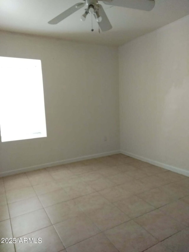 6706 N 54th Dr, Glendale, AZ 85301 - empty room featuring a ceiling fan and baseboards
