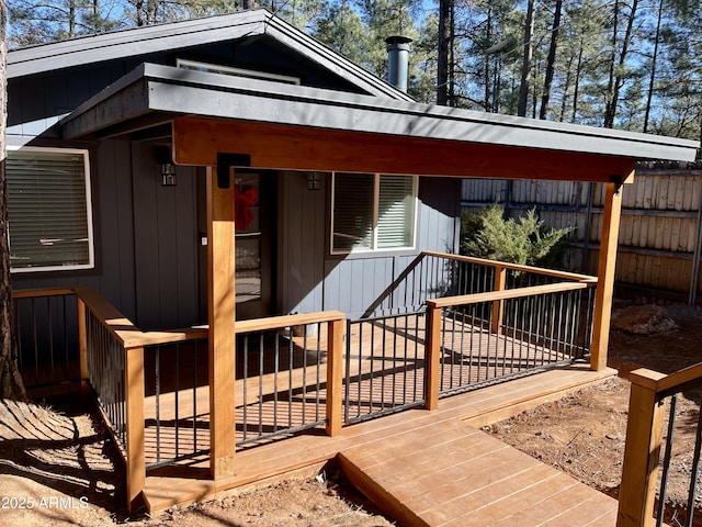 wooden deck featuring fence