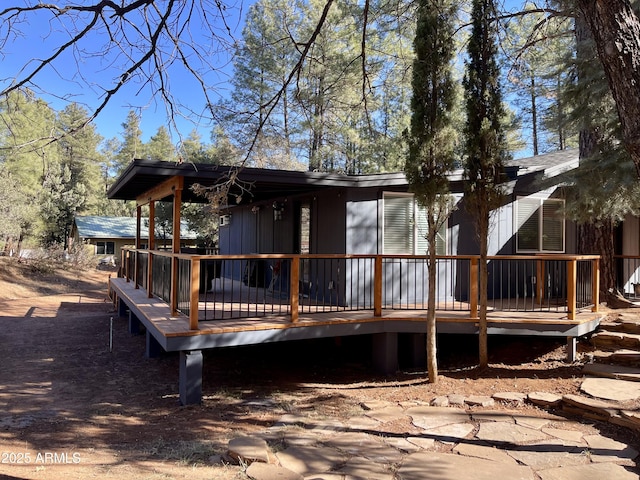 rear view of house with a deck