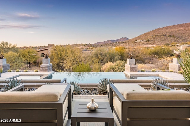 view of patio with a mountain view