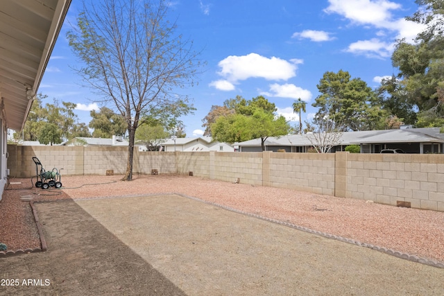 view of yard featuring a fenced backyard and a patio area