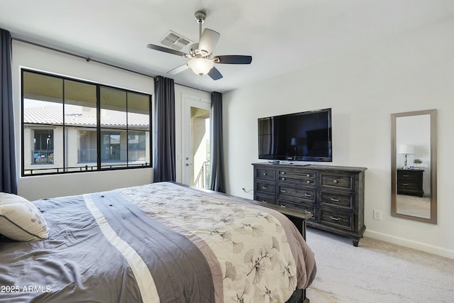 bedroom with light carpet, a ceiling fan, baseboards, and access to exterior