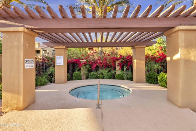 view of pool with a community hot tub, fence, and a pergola