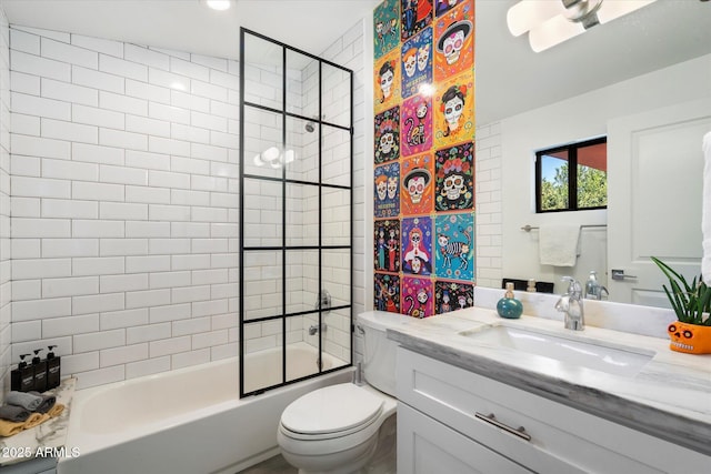 full bathroom featuring toilet, vanity, and tiled shower / bath combo