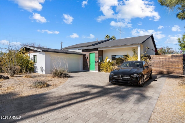 view of front of property with a garage