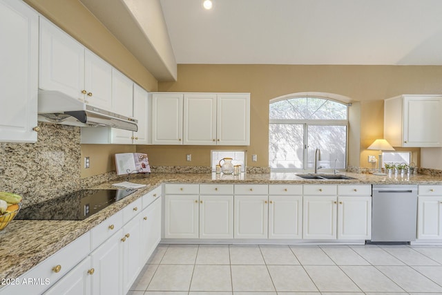 kitchen with black electric stovetop, under cabinet range hood, a sink, white cabinetry, and stainless steel dishwasher