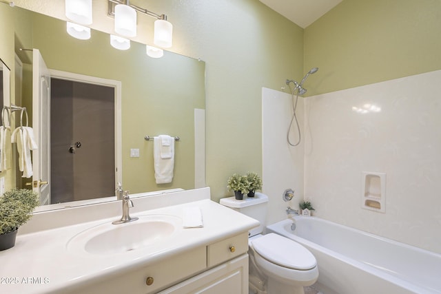 full bathroom with tub / shower combination, vanity, and toilet