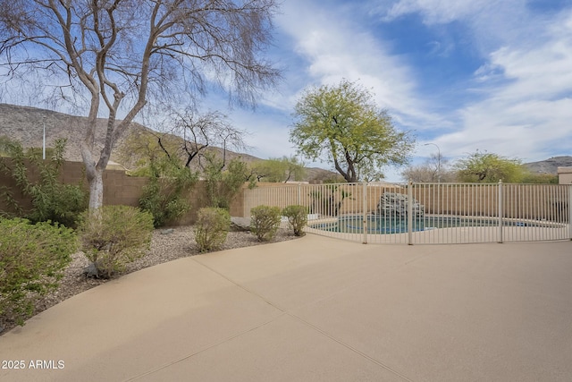 view of patio / terrace featuring a fenced in pool and a fenced backyard