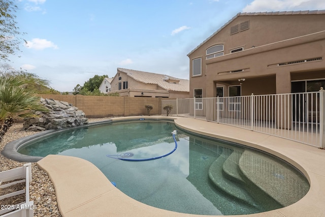 view of pool featuring a fenced backyard and a fenced in pool