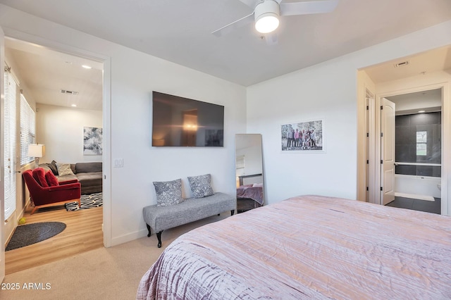 carpeted bedroom with ceiling fan