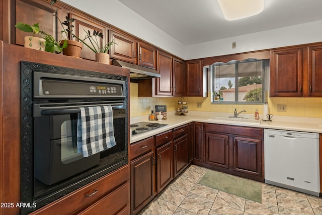 kitchen with dishwasher, backsplash, oven, stainless steel electric stovetop, and a sink