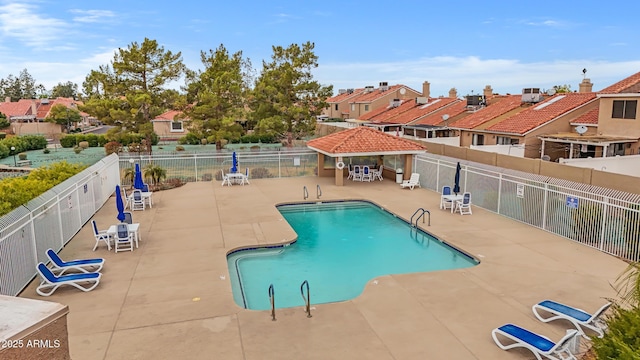 view of swimming pool featuring a gazebo and a patio