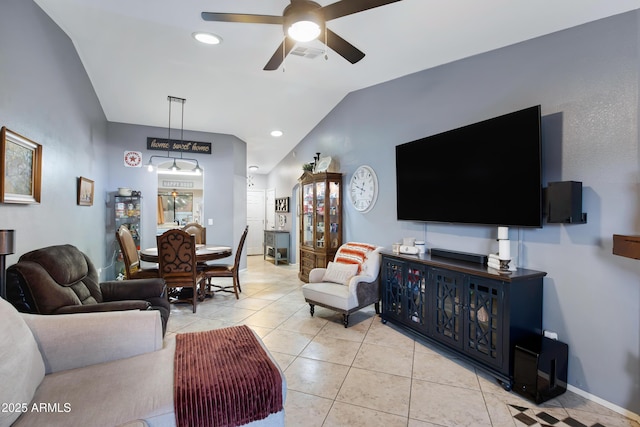 living room featuring light tile patterned flooring, ceiling fan, and lofted ceiling