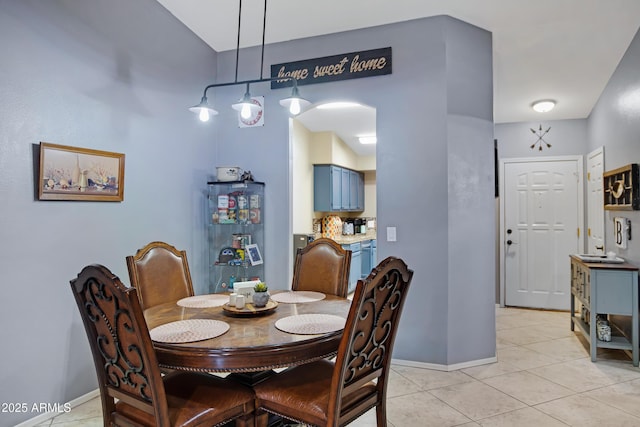 view of tiled dining space