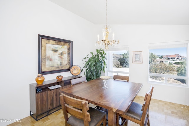 11430 E Manzanita Trl, Dewey, AZ 86327 - dining room with a chandelier, healthy amount of natural light, lofted ceiling, and baseboards