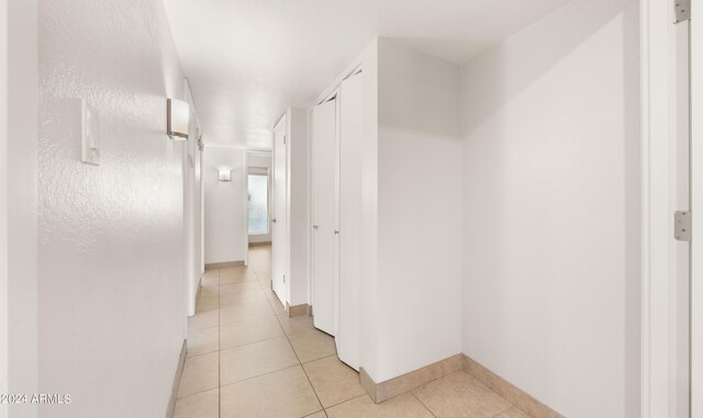 7012 N 22nd St, Phoenix, AZ 85020 - hall featuring light tile patterned flooring