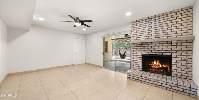 7012 N 22nd St, Phoenix, AZ 85020 - unfurnished living room with ceiling fan, light tile patterned floors, and a brick fireplace