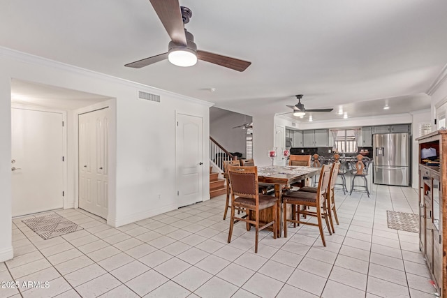 1723 W Mercury Way, Chandler, AZ 85224 - dining area with ceiling fan, ornamental molding, stairway, light tile patterned floors, and baseboards