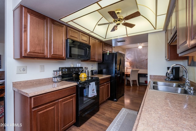 kitchen with ceiling fan, sink, black appliances, and dark hardwood / wood-style floors