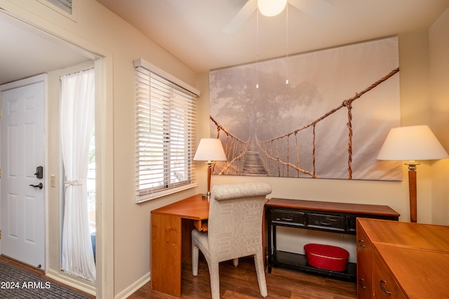 sitting room featuring ceiling fan and dark hardwood / wood-style floors