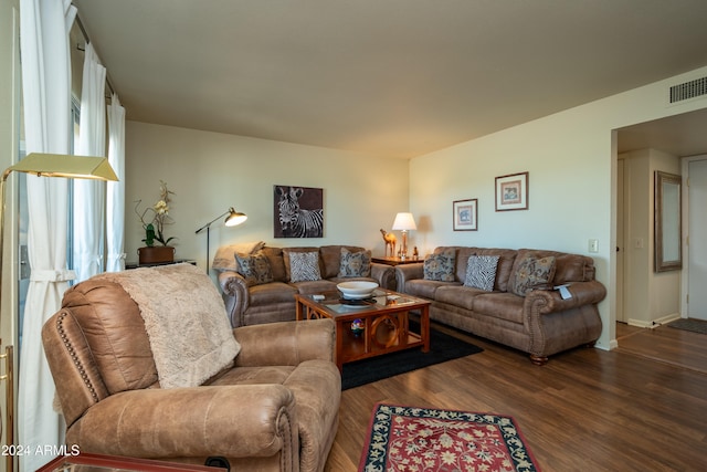 living room featuring dark hardwood / wood-style floors